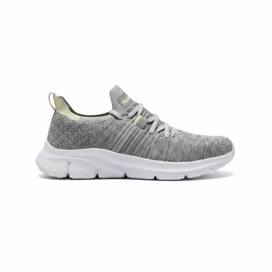 Sneaker grigia singola sfondo bianco